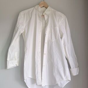Community button up top white XXS